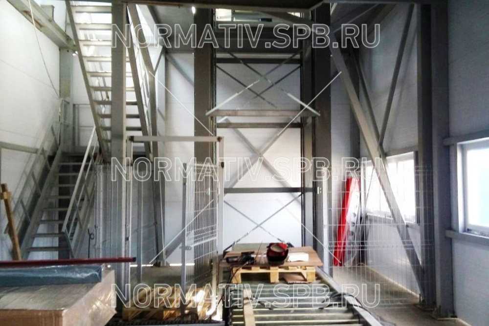 Монтаж конвейерной системы для поддонов на склад: рольганг приводной и паллетный лифт - от ООО "Норматив"