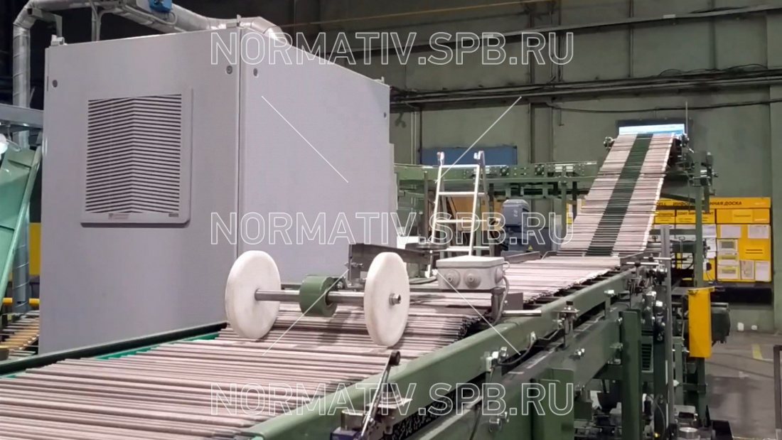 Двухэтажный буферный накопитель для сварочных электродов на основе цепного транспортёра - производственная конвейерная линия от ООО "Норматив"