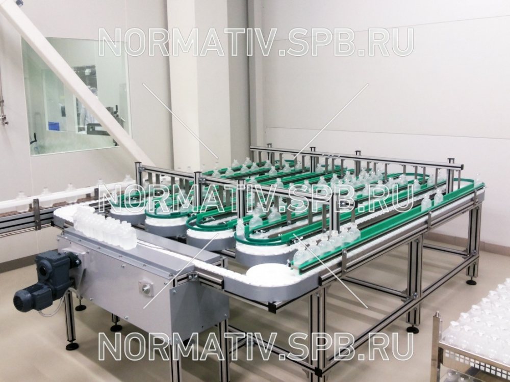 Конвейер накопительный для флаконов с раствором для инъекций - оборудование для фармацевтического производства