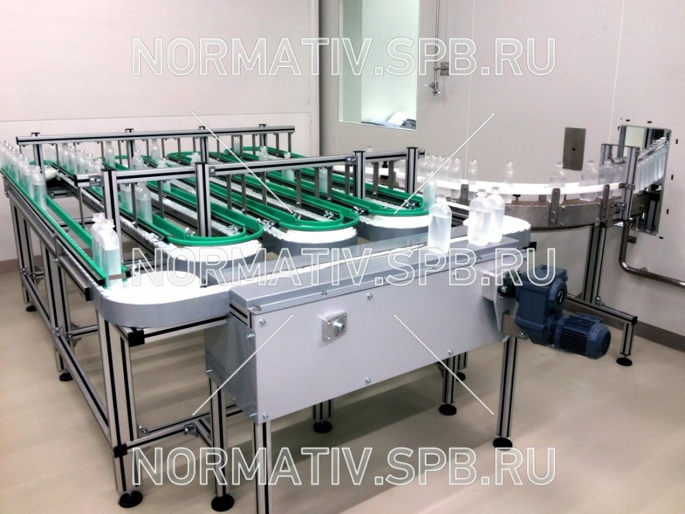Конвейер накопительный для флаконов с раствором для инъекций - оборудование для фармацевтического производства
